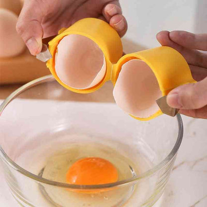 Egg cracked perfectly using a yellow egg opener, ensuring a clean break. Ideal for cooking and baking with no shell mess.