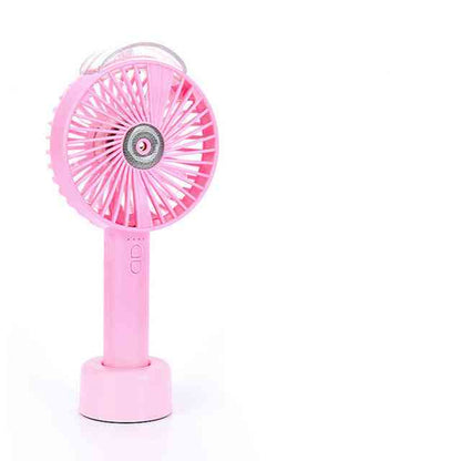 Pink USB handheld fan with a misting function, stylish and portable. Features a rechargeable 1200MAH battery for efficient cooling on the go.