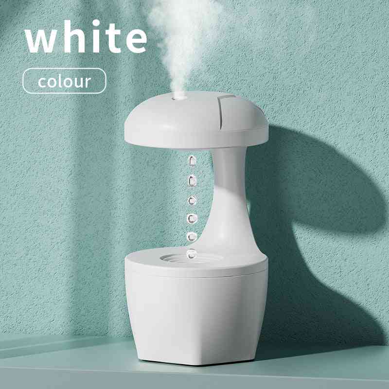 White color anti-gravity humidifier with ultrasonic fog. Stylish and modern design for home or office use.