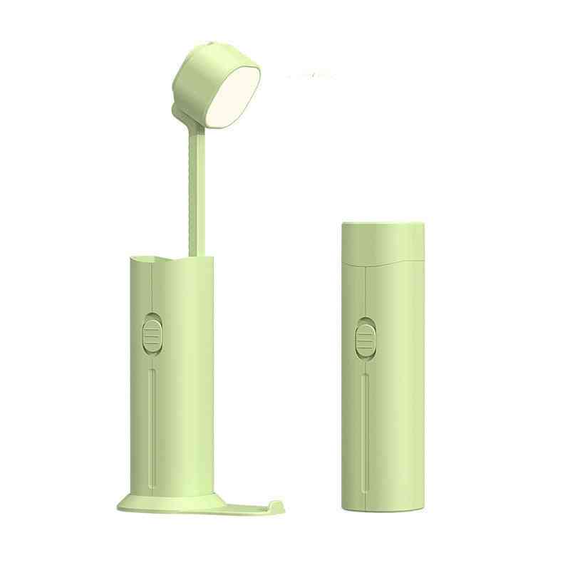 Green multifunctional table lamp with an adjustable LED head and portable design. Ideal for lighting, charging, and general use.