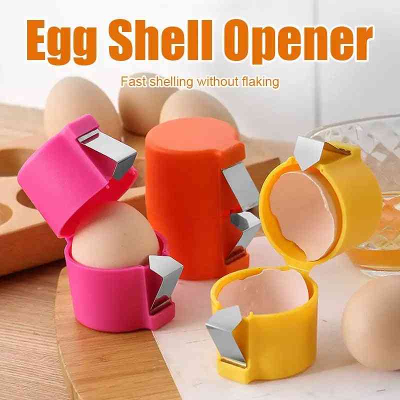 Egg shell opener in vibrant colors with a sharp stainless steel blade for fast and clean egg cracking. Ideal for hassle-free kitchen use.