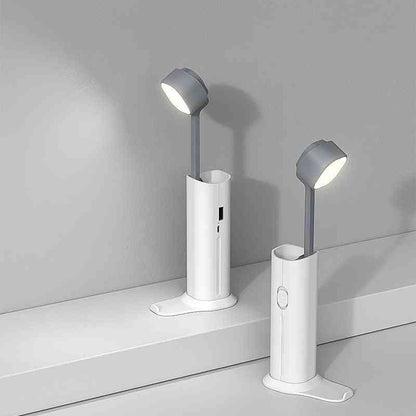 White multifunctional table lamp with a gray LED head, USB charging, and modern design. Perfect for desk, bedside, or travel use.