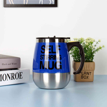 Dark blue self-stirring electric coffee mug with stainless steel base and black handle, designed for easy mixing of coffee or tea.